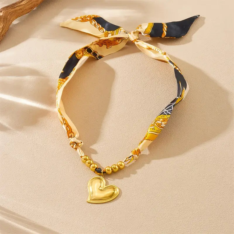 Foulard fantasia: croce, cuore, cuore lungo e aquila